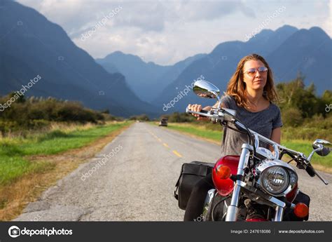 Woman Riding Motorcycle Scenic Road Surrounded Canadian Mountains Taken