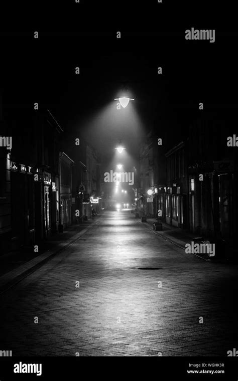 Illuminated Street Lights At Night Stock Photo Alamy