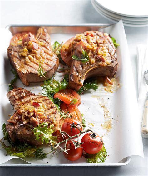 Dredge them in flour seasoned liberally with salt and if i had to cook some thinly sliced pork chops i would smother them, southern style. Grilled Pork Chops with Bacon and Tomato in 2020 | Pork recipes, Pork, Juicy pork chops