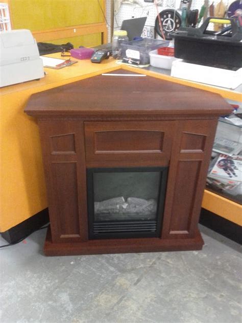 This sturdy electric fireplace tv stand offers a classic look and a 5000 btu powerful heating system to make the room. Corner Electric Fireplace and Mantel Ladysmith, Cowichan