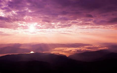Beautiful Sunset On The Mountain With Sun And Clouds Photograph By Ioan