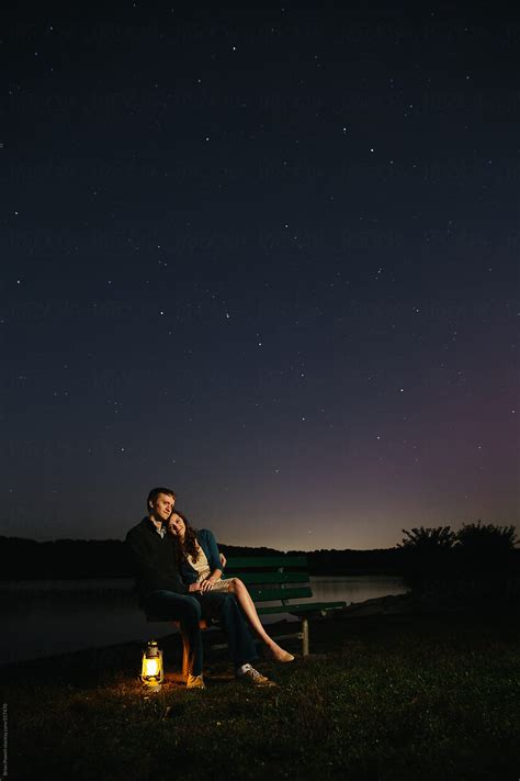 Young Couple Under The Stars At Night Stocksy United