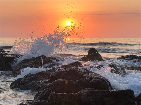 Rocky Shore During Sunset With Ocean Waves · Free Stock Photo