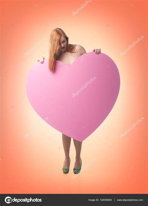 Naked Woman Holding A Heart In His Hands Stock Photo By Himchenko