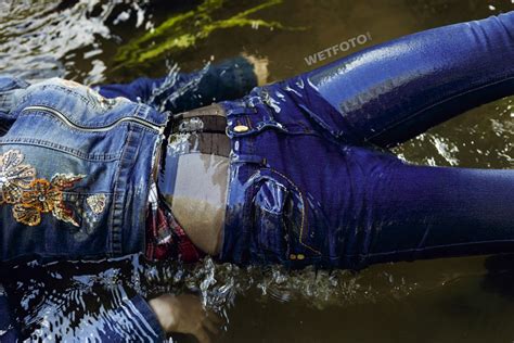 Fully Clothed Girl In Jacket Jeans And Tights Get Wet By The River Wetfoto Com