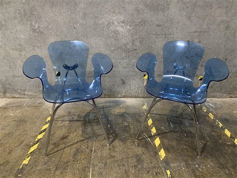 They are very sturdy and weigh 15lbs. Any help identifying these Lucite chairs? : Mid_Century