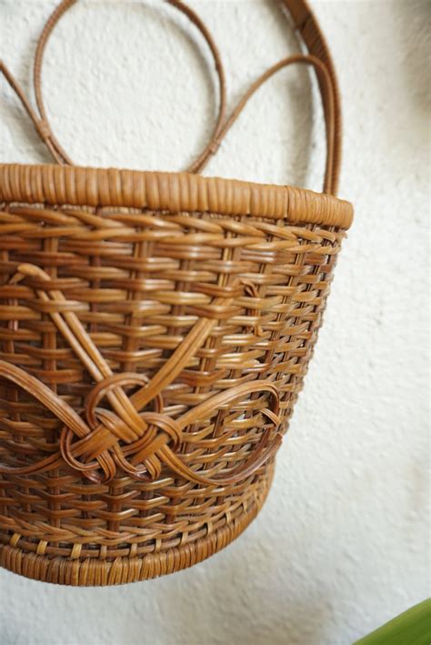 By choosing a large wicker basket, the maker makes sure nowadays wicker baskets have become more popular. Vintage Dark Brown Bamboo Rattan Wicker Wall Basket