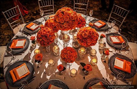 Tangerine Roses Silver Accents And Glittering Votives Orange Wedding