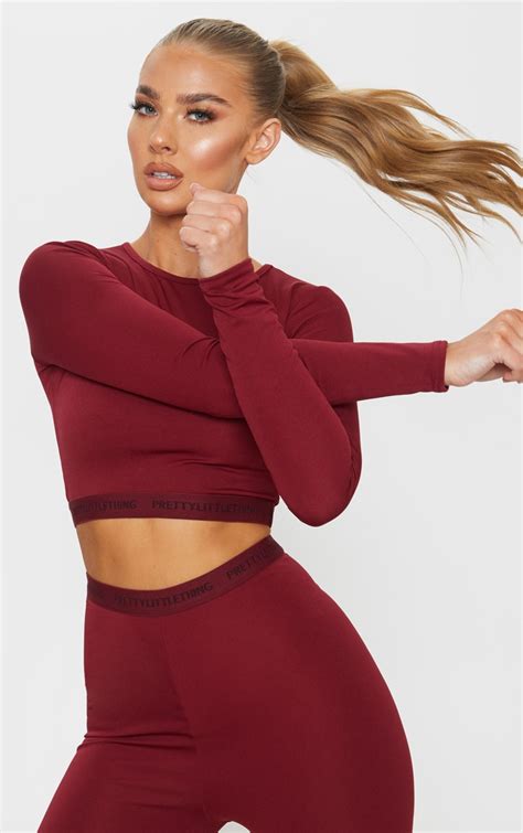 Plt Berry Sport Long Sleeved Cropped Top Prettylittlething