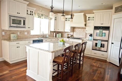 The kitchen in our house had already been remodeled, but with maple cabinets. Sita Montgomery Interiors: My Home Tour: Kitchen