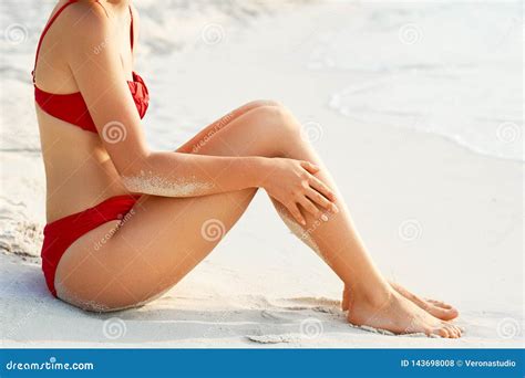 Woman Sunbathing On Tropical Beach Legs Stock Photo Image Of Bodycare Beach