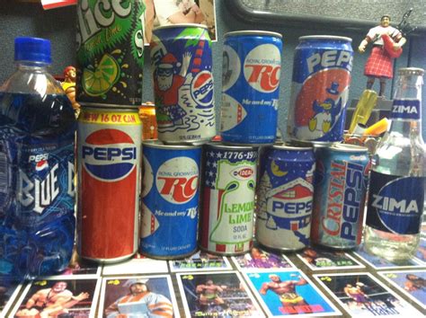 I don't drink a 2 liter fast enough and it always goes flat. Some old soda cans. A bottle of unopened Pepsi Blue and a ...