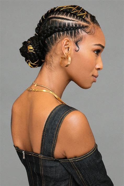 This cute braided hairstyle can be done with straight hair, or. Um, This Braided Bun With Gold Stitching Is Definitely the ...