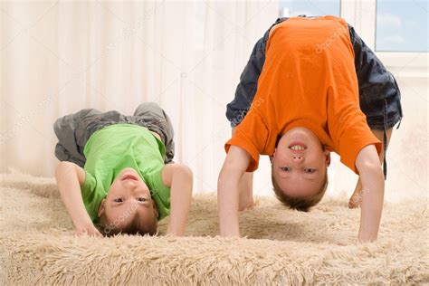 Children Playing On The Carpet Stock Photo By ©privilege 3209002