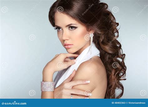 Attractive Brunette Girl Model With Long Wavy Hair Styling Make Stock
