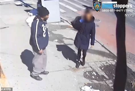 Shocking Moment Man Sucker Punches Woman Crossing The Street In