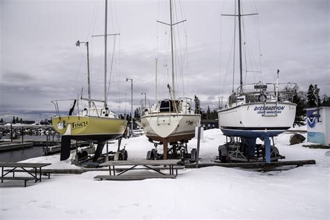 Three Boats At The Marina In The Winter In Grand Marais Minnesota