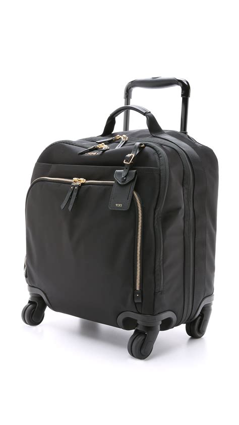 No changes, just a reminder! Tumi Oslo 4 Wheel Compact Carry On Luggage - Black in ...