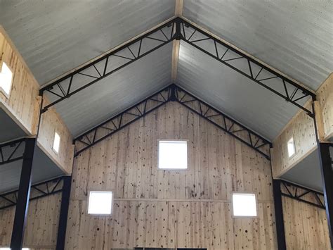 Galvanized Steel Ceiling Against The Exposed Beams And Shiplap Are A