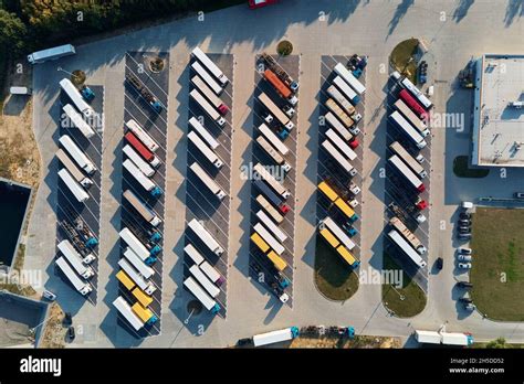 Parking Lot For Semi Trucks Top View Aerial View Of Truck Trailers Parked For Waiting Loading