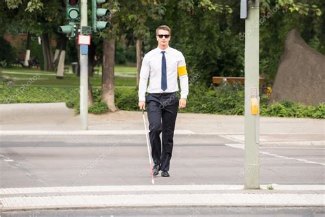 Blind Man Crossing Road — Stock Photo © Andreypopov 119664680