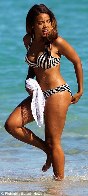 Angela Simmons Pours Curves Into Striped Bikini To Soak Up The Sunshine