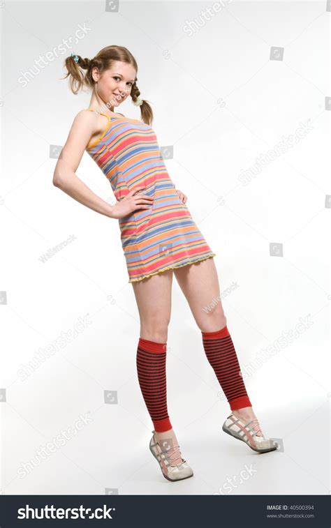 Sexy Model With Pigtails Dressed Rainbow Striped Short Dress Stock