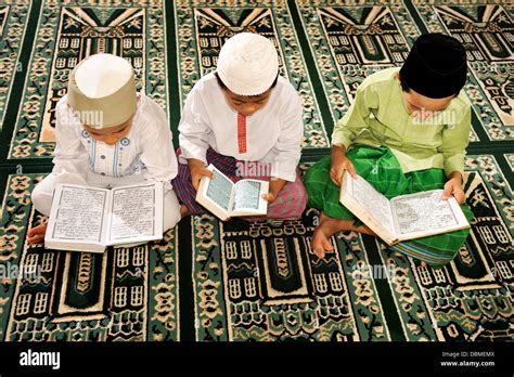 Children Reading Koran Stock Photo Alamy