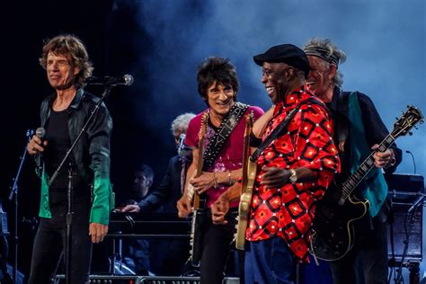 The rolling stones announce 40th anniversary reissue of 'tattoo you' featuring unreleased tracks. Pictures of Rolling Stones members with other famous people