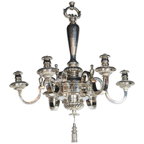 Center body is lacquered matte black, with a convex brass bowl at the bottom. Silver Plated Caldwell Six-Light Chandelier For Sale at ...