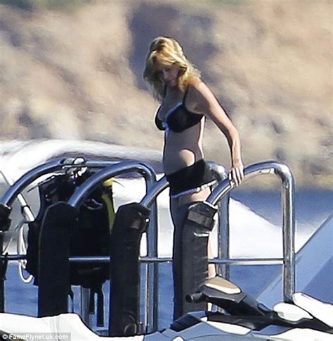 Melanie Griffith Strips To Her Bikini For A Romantic Cruise With