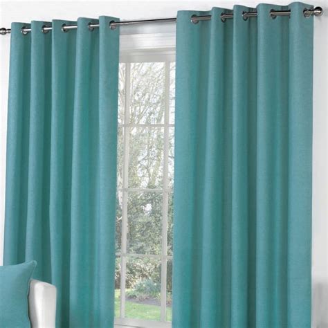 Sorbonne Fully Lined Eyelet Curtains Teal Blue Tonys Textiles