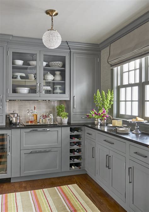 Pairing contrasting cabinets and countertops can create a contemporary kitchen look. Gray Cabinets Black Countertops 11 - decoratoo