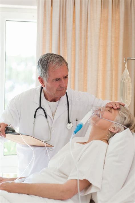 Doctor Examining His Patient Stock Image Image Of Emergency