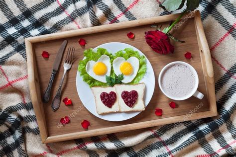 Breakfast In Bed With Heart Shaped Eggs Toasts Jam Coffee Rose And Petals Valentines Day