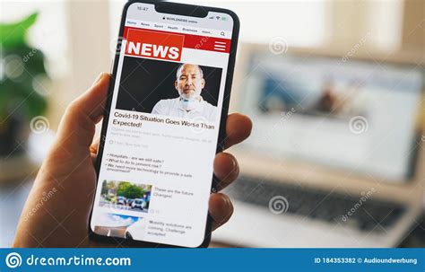 Online News On A Smart Phone Close Up Of Businessman Reading News Or Articles In A Mobile Phone