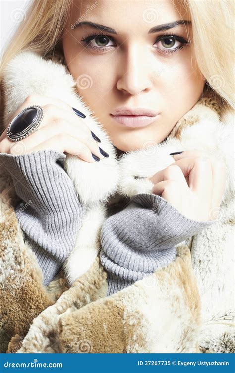 beautiful blond woman girl in mink fur coat winter fashion stock image