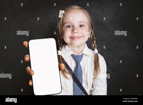 Cute Young Girl School Student Holding Smartphone With Blank Empty