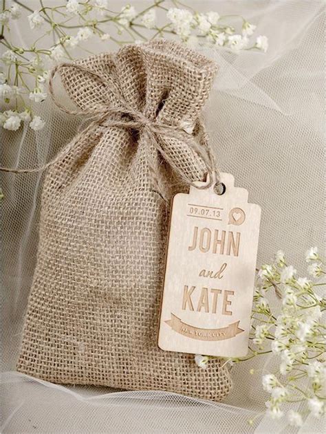 Looking for a cheap wedding favor idea? Custom burlap wedding favor bags with wooden tags. Favors ...