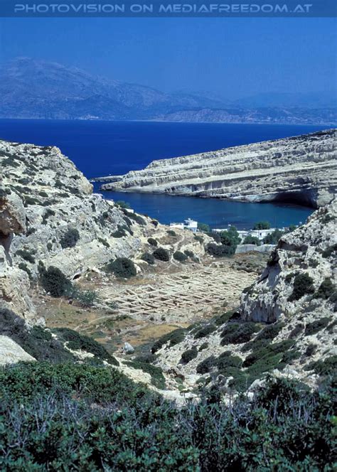 Climb up to access some of the caves, cut into. Matala Beach 05 - Matala - Kreta