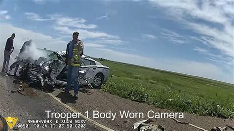 Suspect In The Back Of Colorado Troopers Car Moves Himself Into The