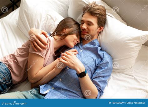 Young Spouses In Love Hugging Each Other In Bedroom Stock Image Image Of Jeans Hugging 183193529