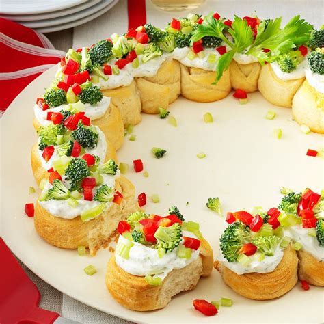 So, think about cute santa themed recipes or christmas trees shaped food or santa cheeseballs or snowman cheeseballs. Appetizer Wreath Recipe | Taste of Home