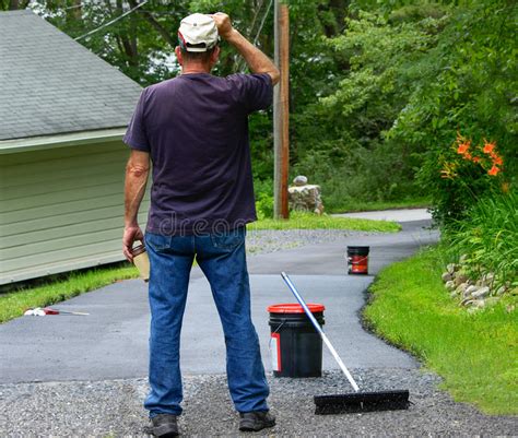 Driveway repair and diy pothole repair made simple with ez street cold asphalt. Home Maintenance. Do It Yourself Driveway Resealing. Stock Photo - Image of blacktopping ...