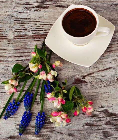 A Cup Of Coffee And Beautiful Flowers Stock Image Image Of