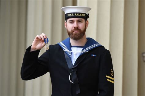 royal navy sailor receives queen s medal after saving 27 lives plymouth live