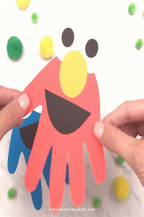 Handprint Sesame Street Craft For Kids This Handprint Elmo And Cookie