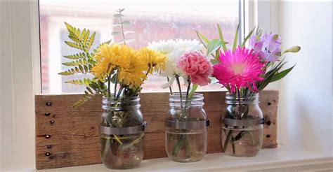 You'll just need a couple of supplies, some wood, the bees, and your mason jars, to get started! DIY Mason Jar Wall Organizer