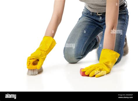 Housework And Housekeeping Concept Young Woman In Rubber Glover Cleaning Floor Over White