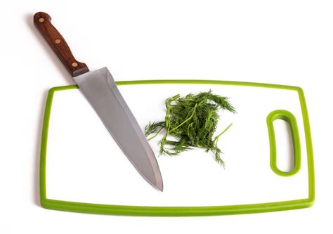 Premium Photo Parsley And Knife On A Cutting Board